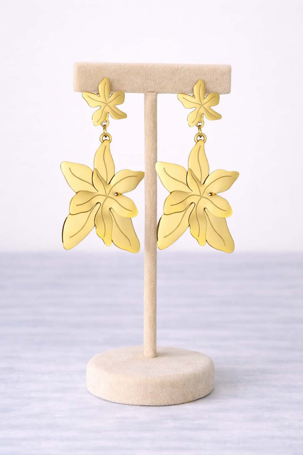 Boucle d oreilles pendante dorée