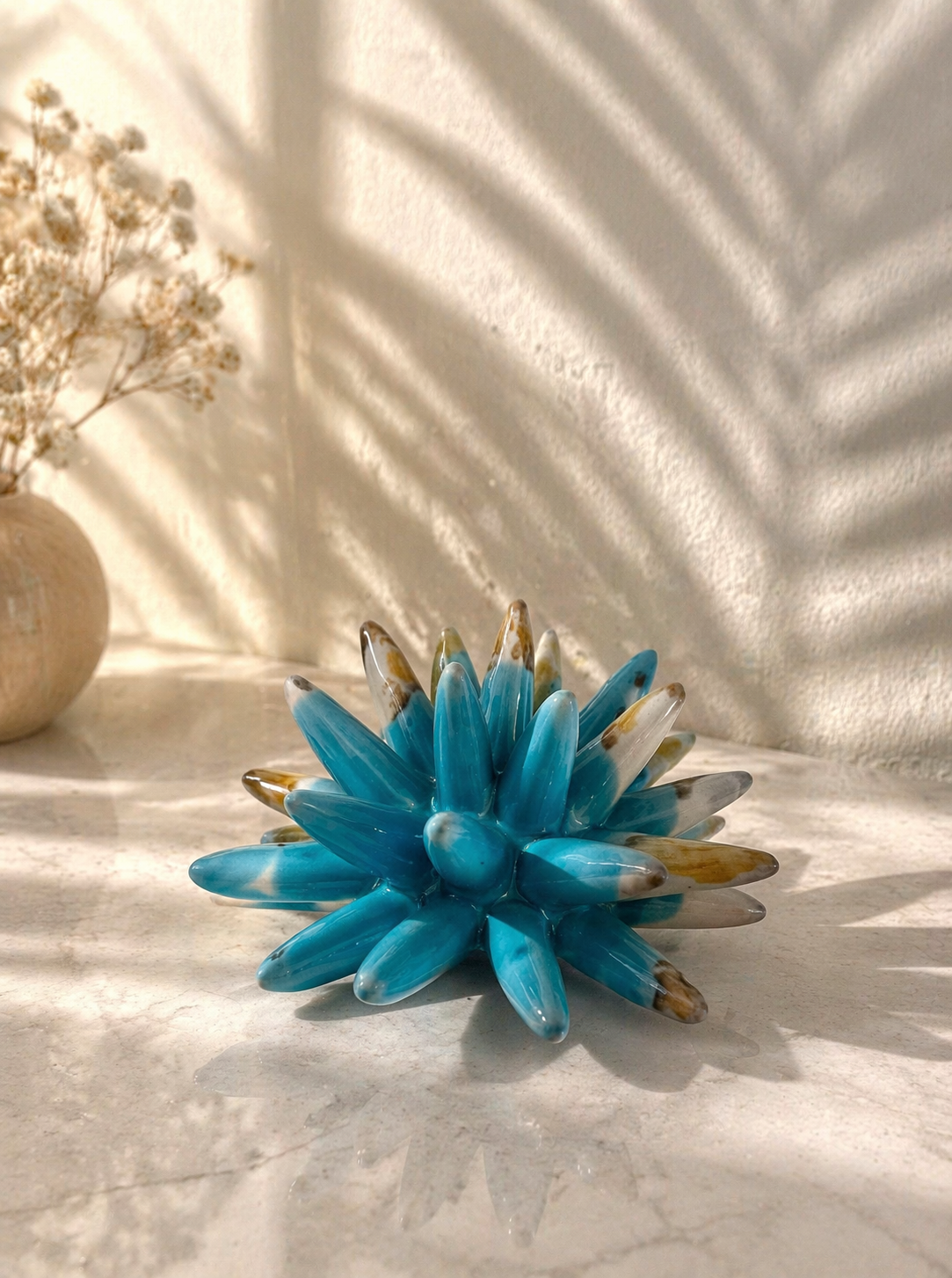 Riccio in ceramica