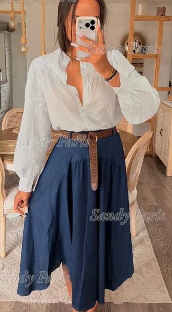 Uitlopende jeans rok met ceintuur