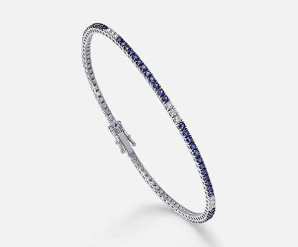 BRACCIALE TENNIS 18K Zaffiri ct.1,81 diam. ct.0,38 cm.17,5