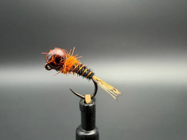 Nymphe Orange Mécanic – Une arme redoutable pour les truites et les ombres