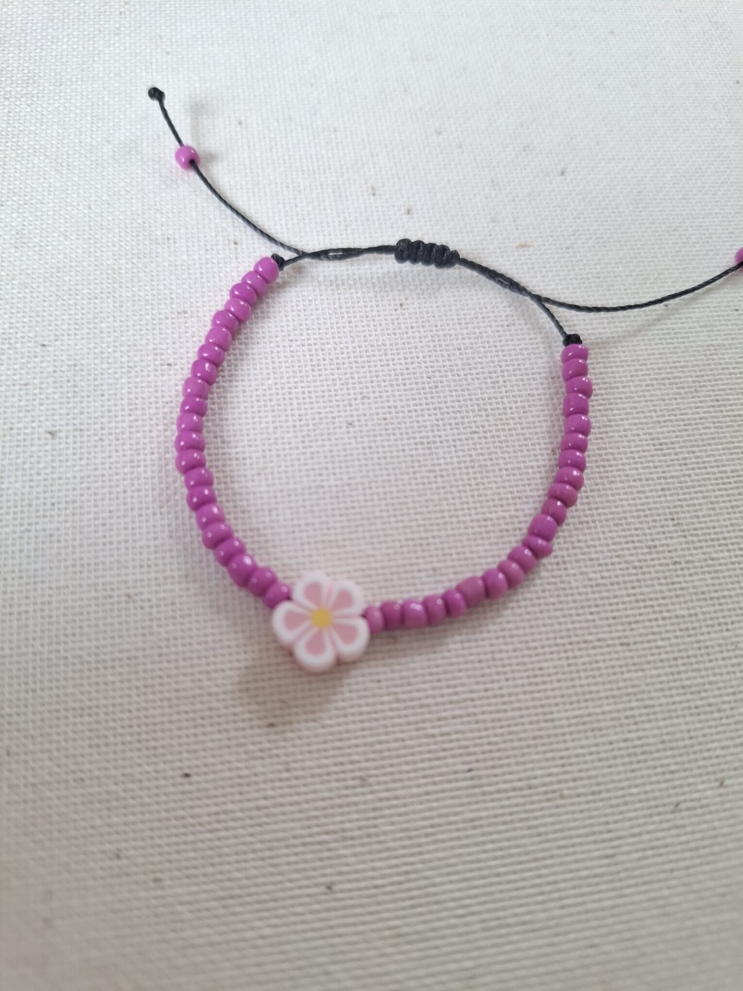 Armbandje- paars roze