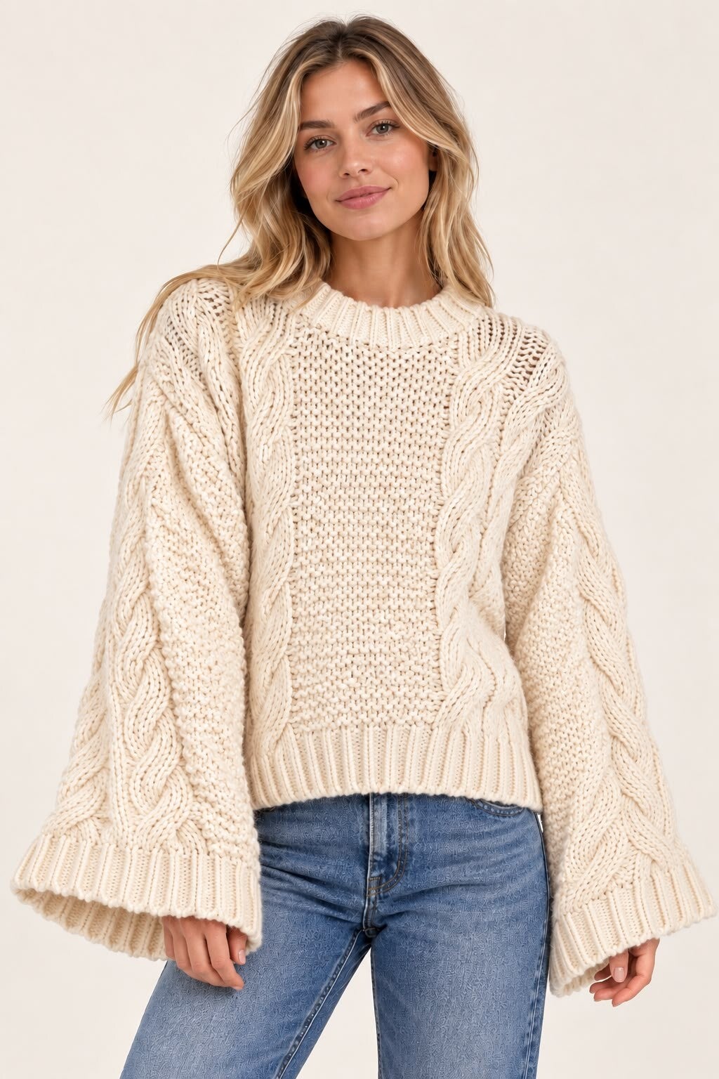 beige gebreide kabeltrui