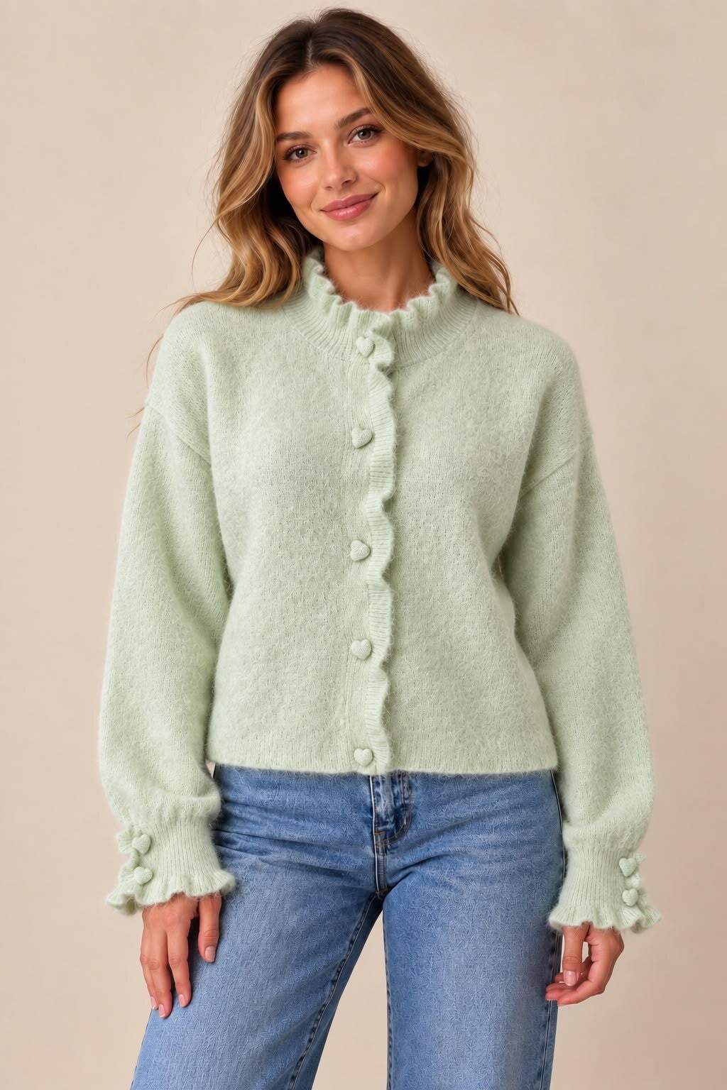groene zacht gebreide vest met hartjes knopen