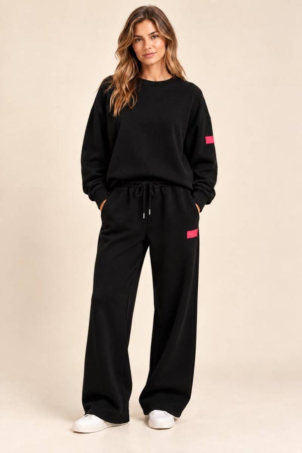zwart huispak met roze label 50