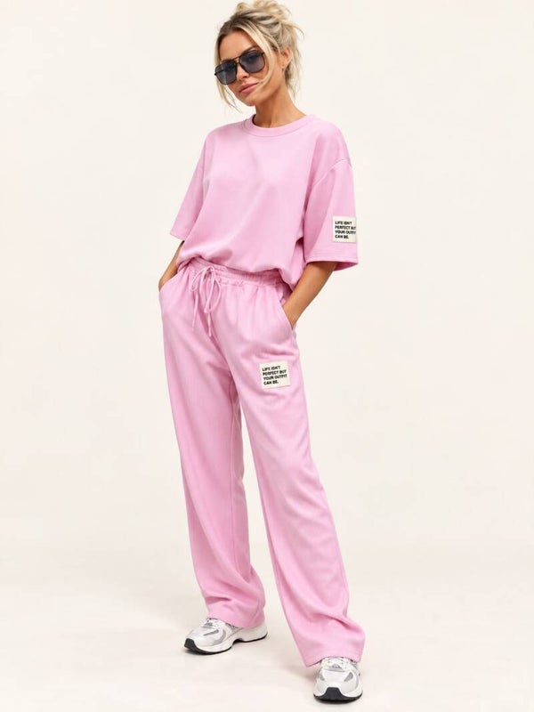 roze huispak met witte label 14
