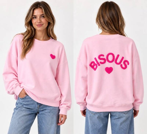 roze trui bisous