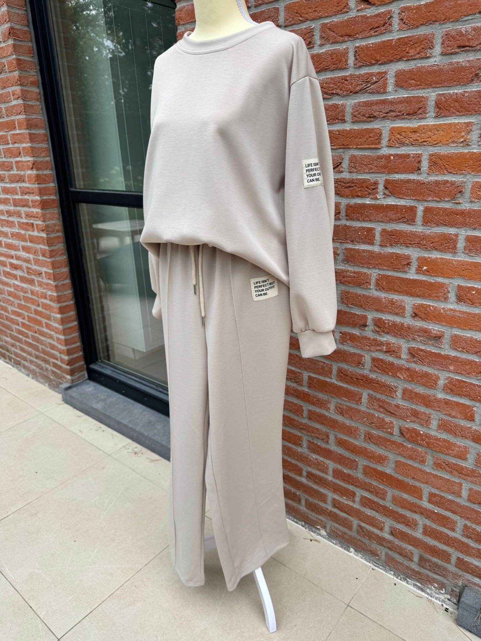 Beige huispak met lange mouwen