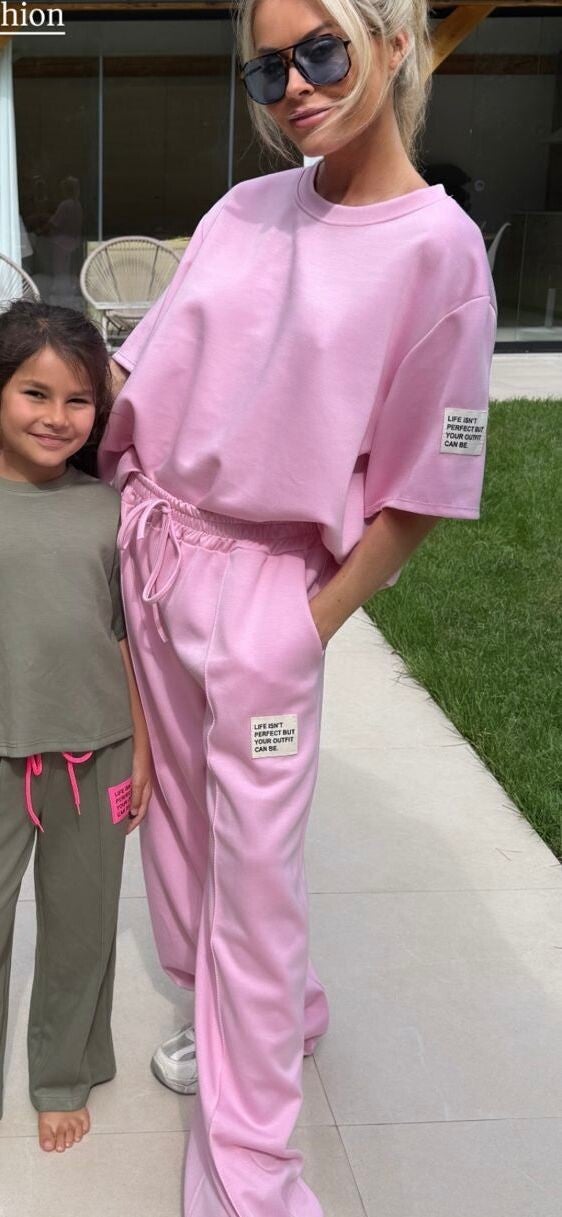 roze huispak met witte label