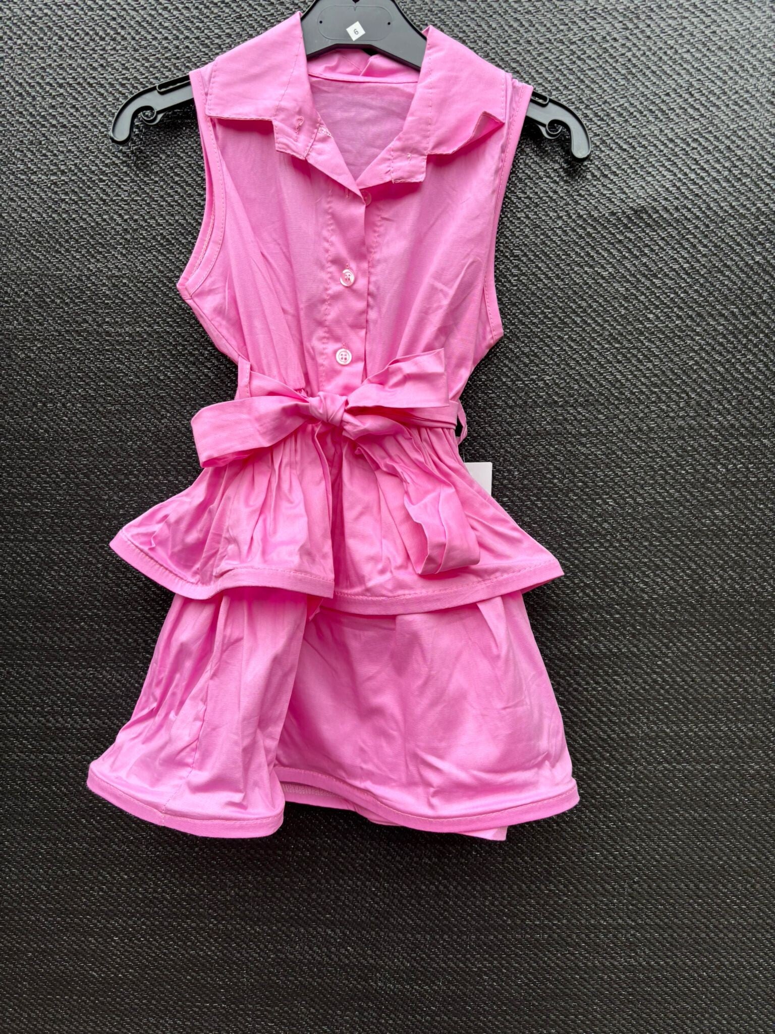 chique meisjesjurk met strik roze