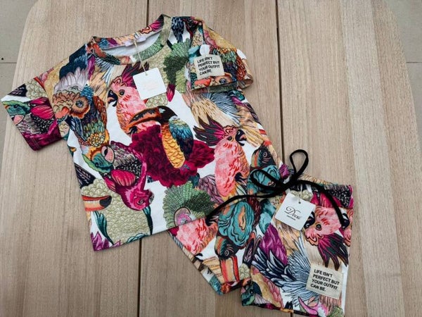 Meisjesset met gekleurde vogeltjes