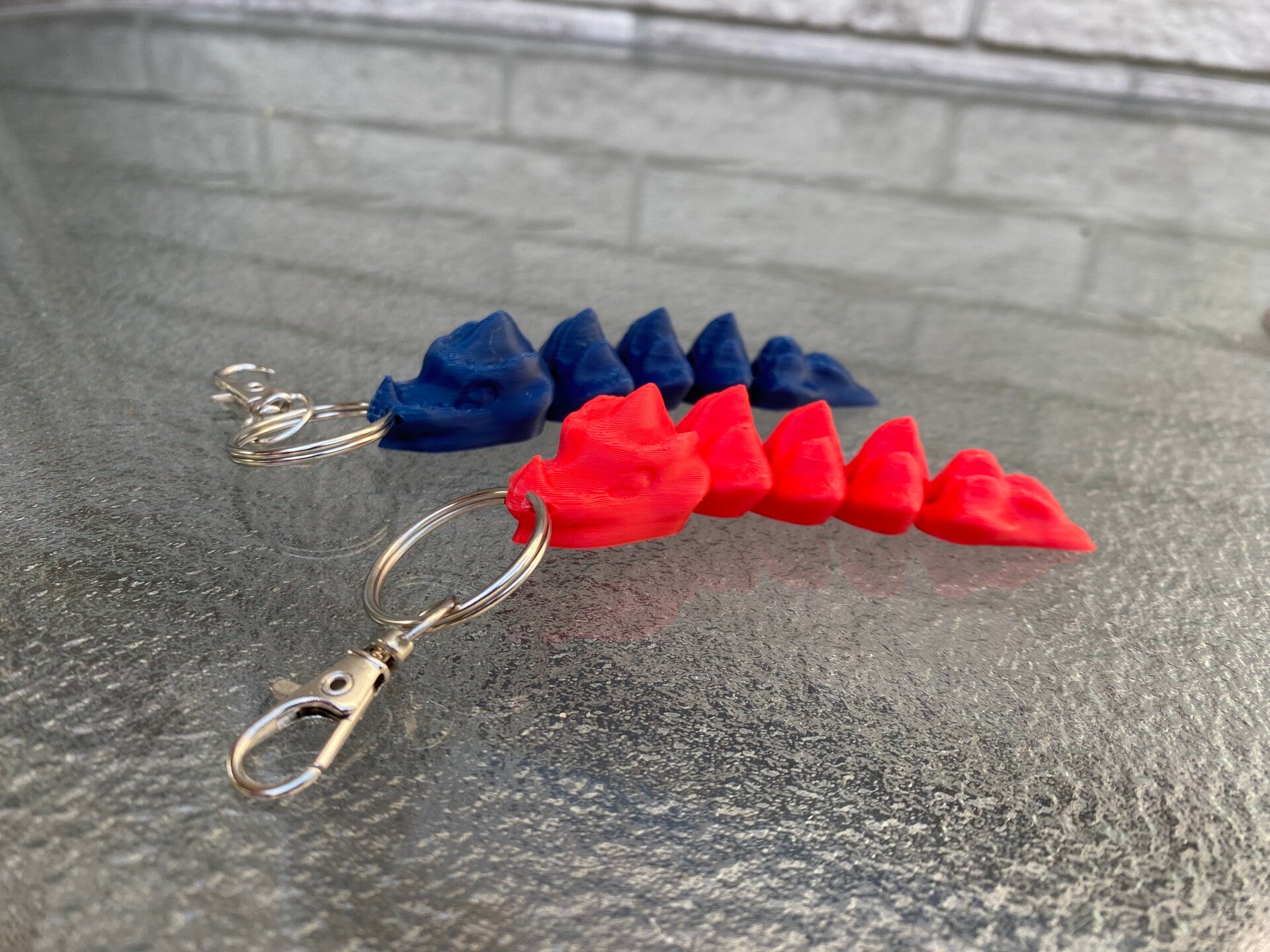 Articulating Dragon backpack tags