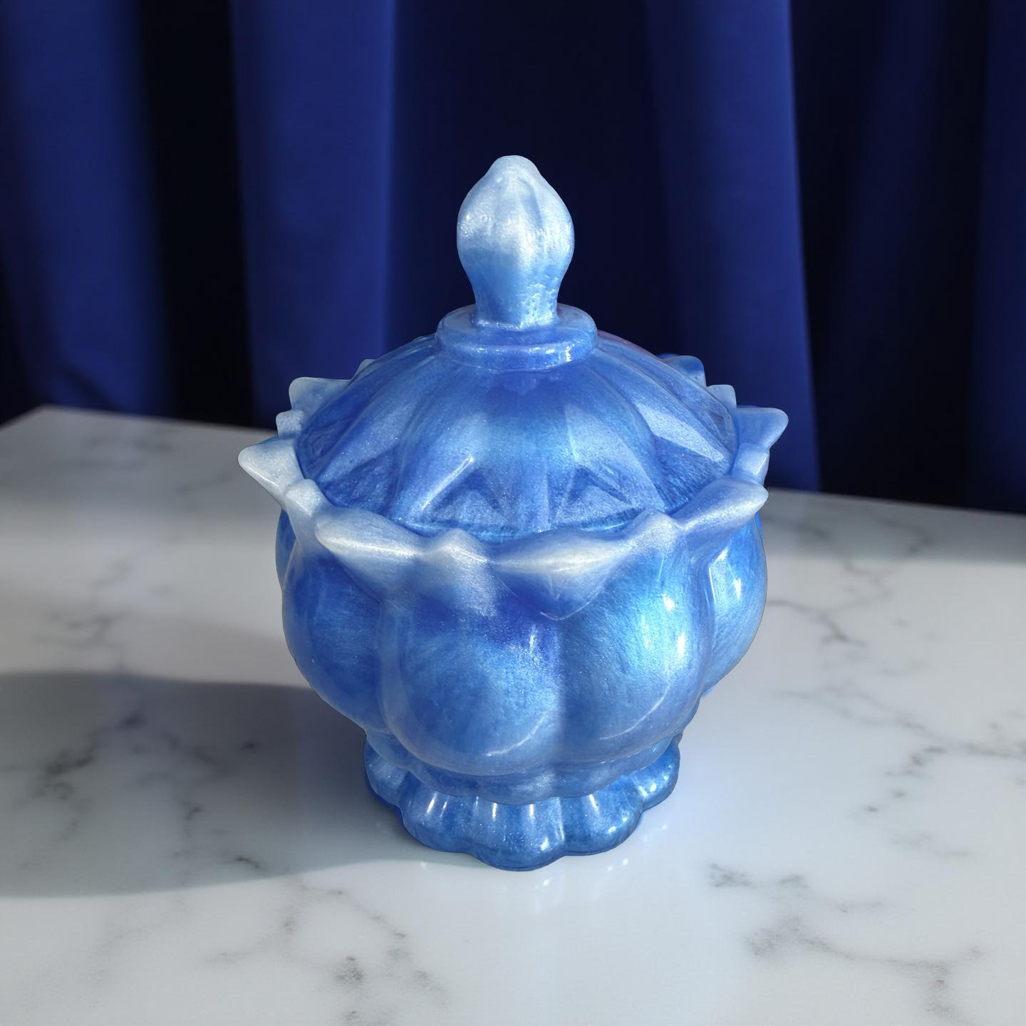 The elegant, lotus trinket vase.