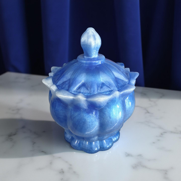 The elegant, lotus trinket vase.