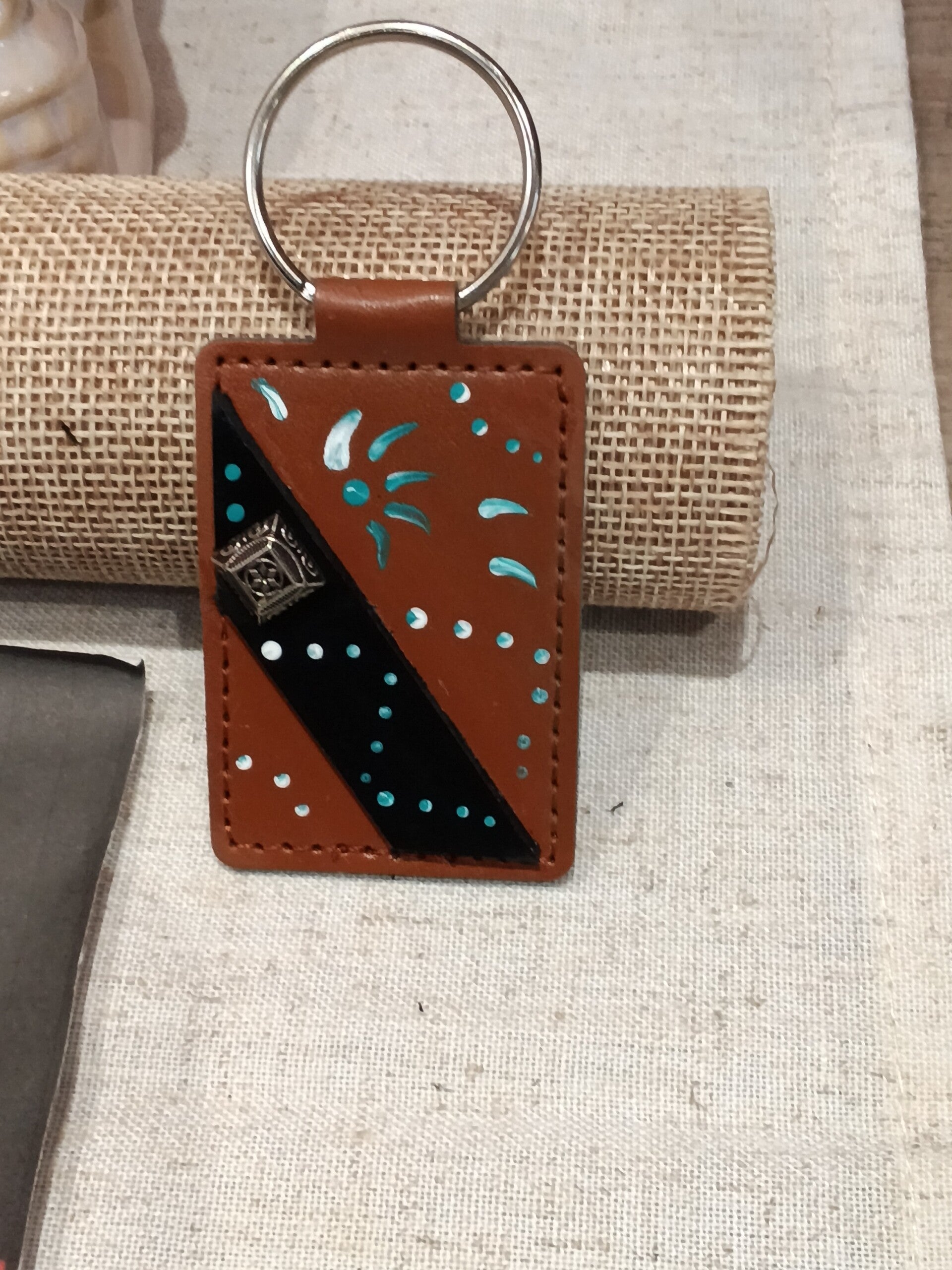 Porte clefs brun et bleue ciel