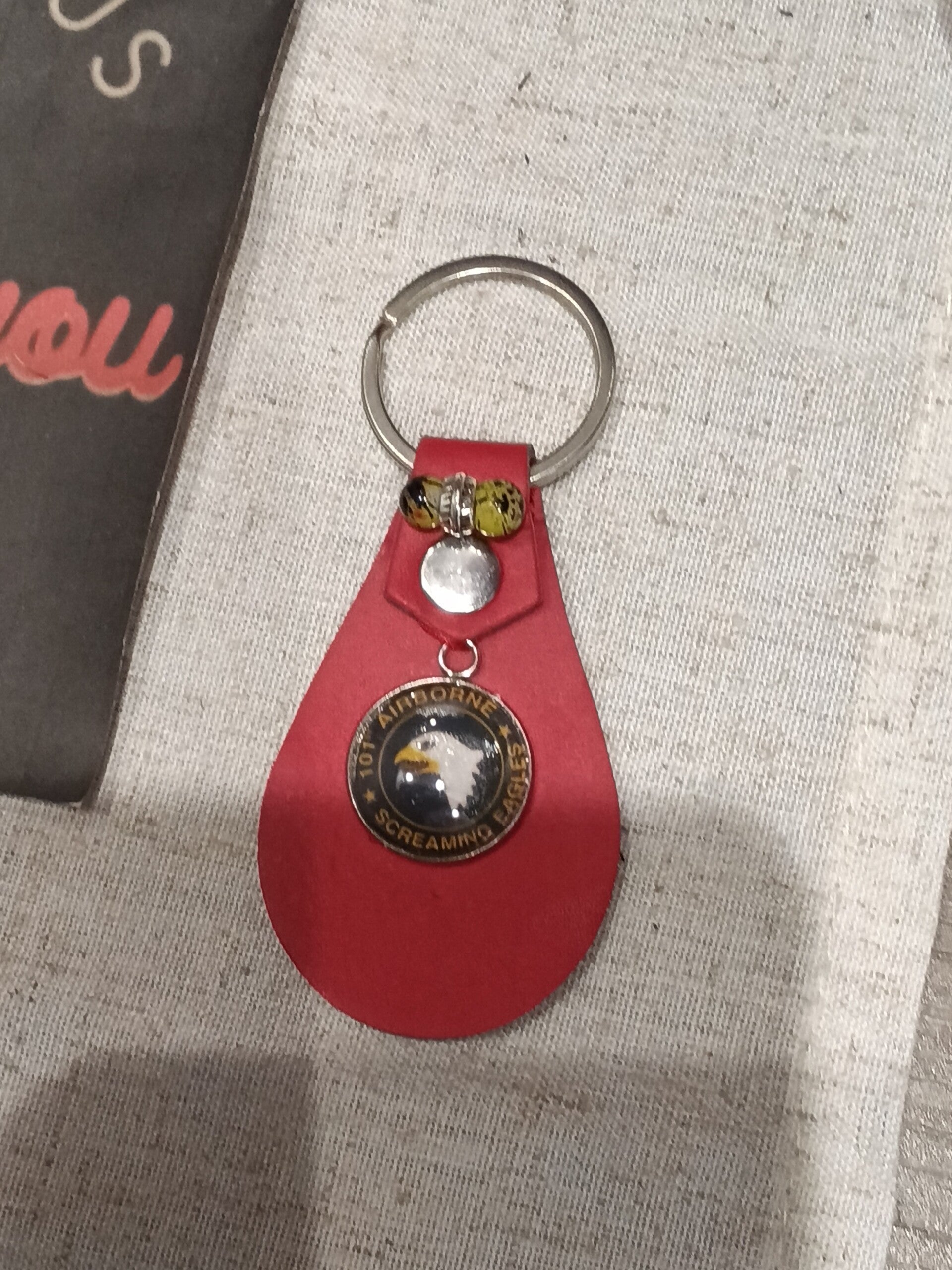 Porte clé perle 101eme