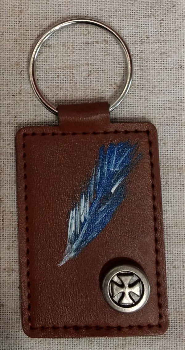 Plume bleu et croix de Malte