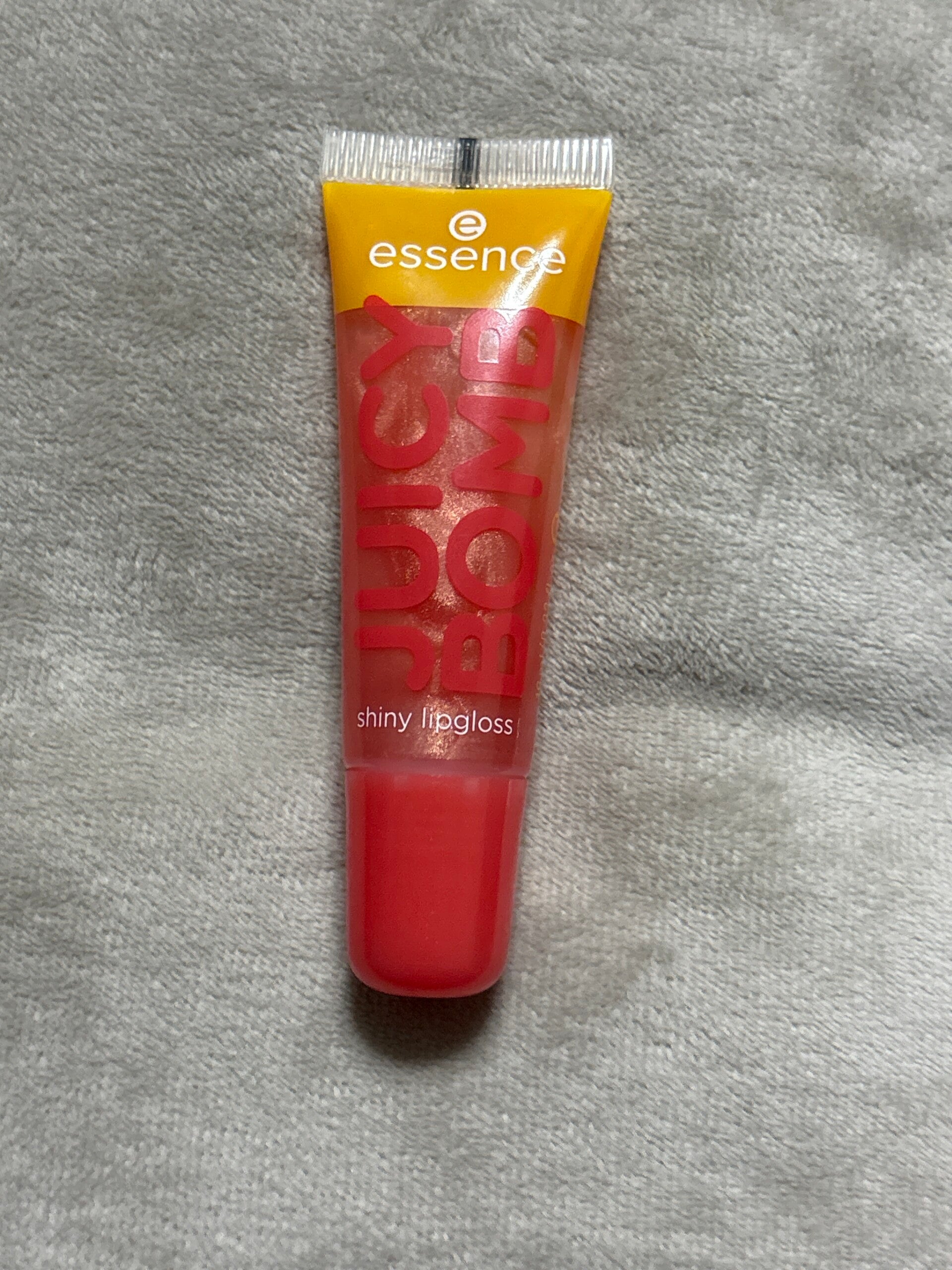 essence juicy bomb shiny lipgloss proud papaya