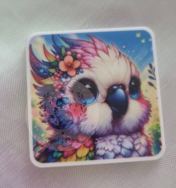 Cover-Minder Plat – Plume la Petite Cacatoès