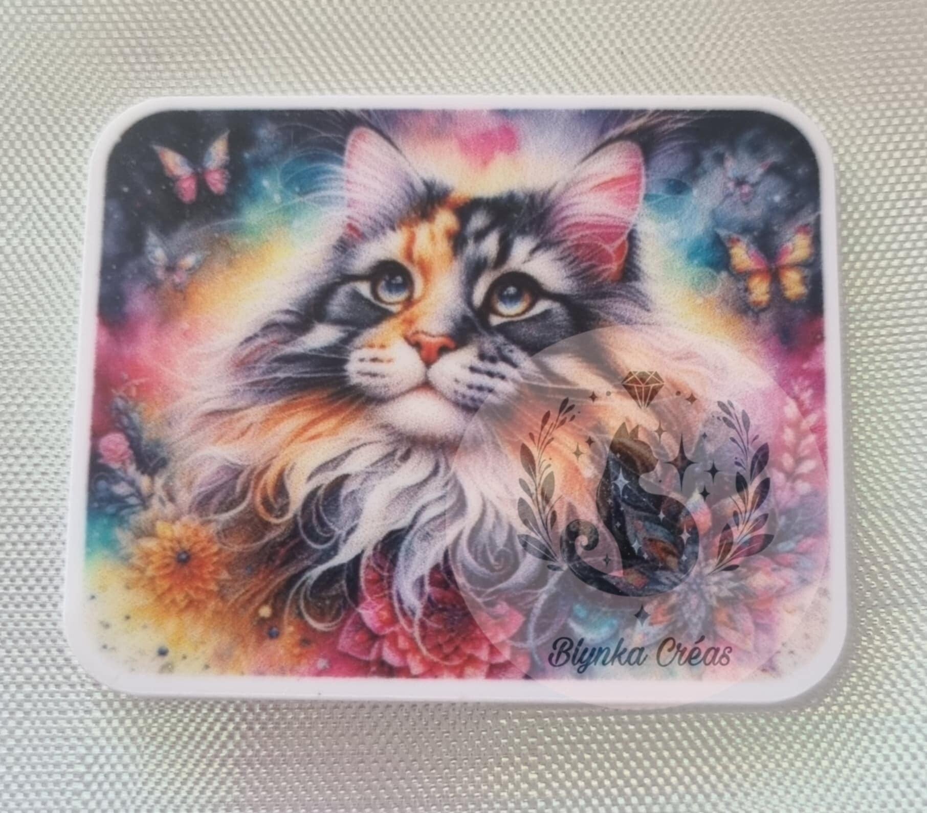 Cover-Minder Plat – Le Chat aux Fleurs Magiques