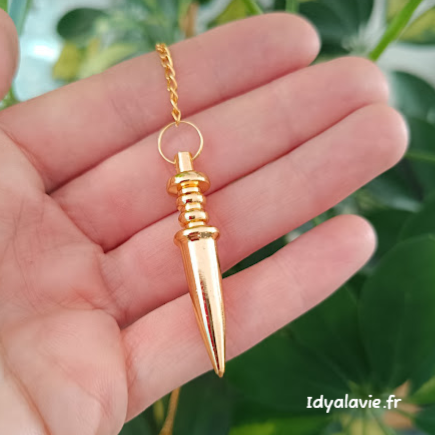 Pendule pointe dorée laiton