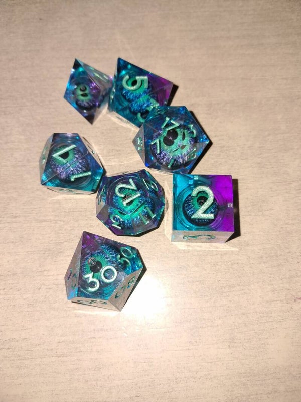 Blue/purple moving dragon eye d&d dice set