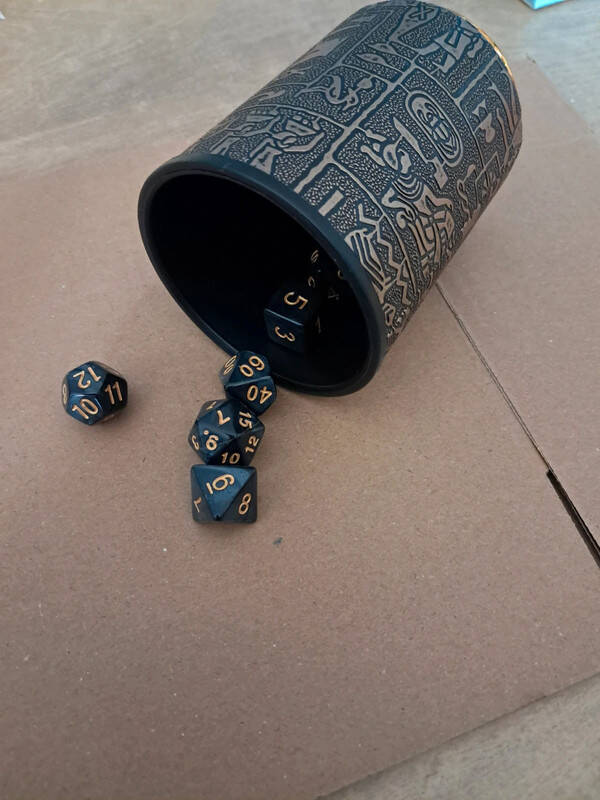 Egyptian Themed dice cup with black d&d dice