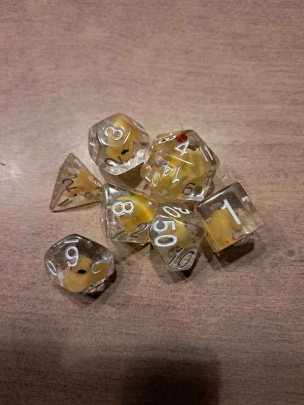 Yellow Rubber Ducky d&d dice (in a tin can)