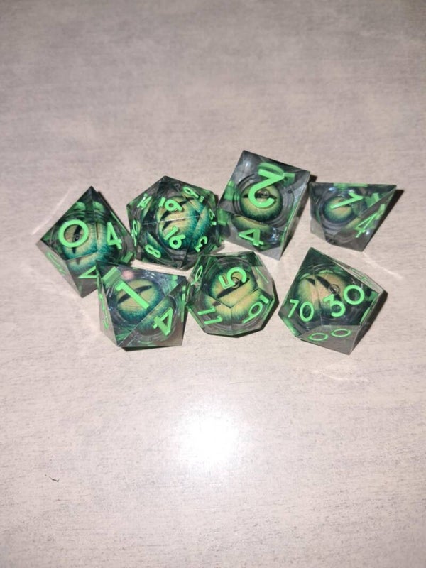 Green moving dragon eye d&d dice with green nrs