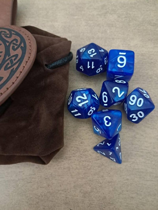 Round runic themed brown leather dice bag with d&d dice