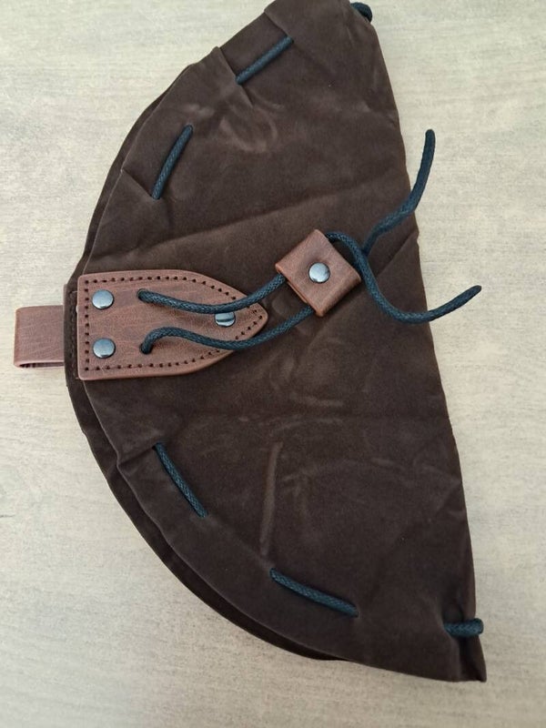 Brown leather dice bag with d&d dragon dice