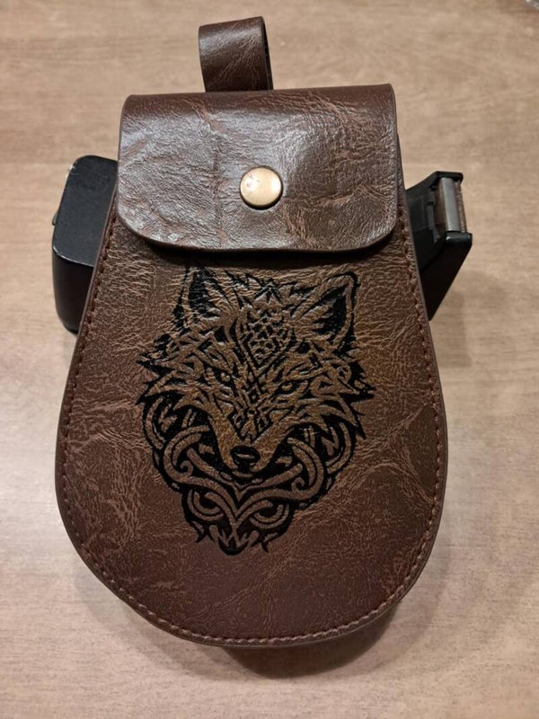 Wolf leather dice bag with Purple d&d dragon dice