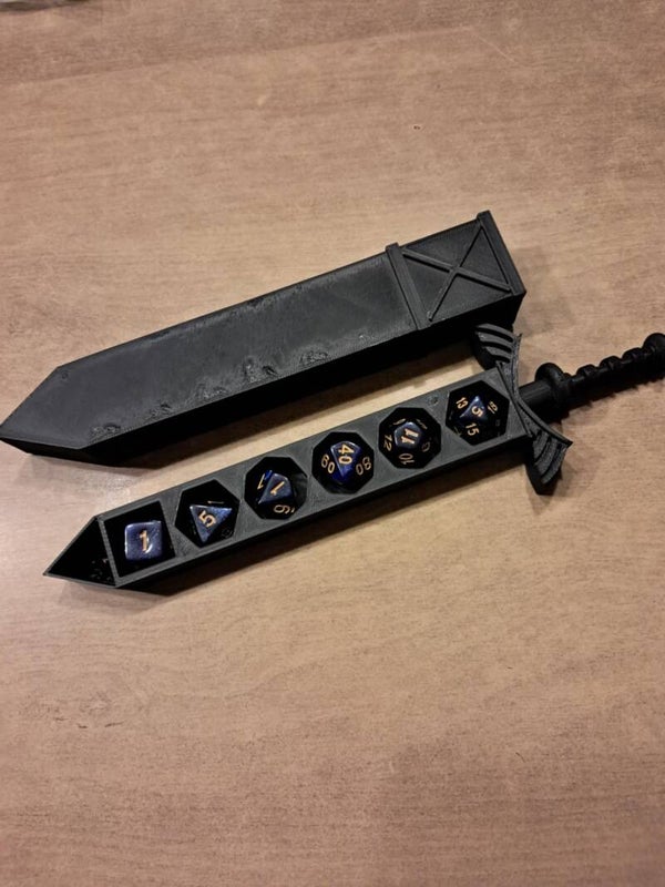 Black dice sword with sparkly blue d&d dice