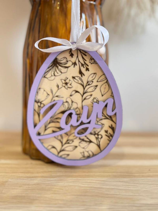 Œuf fleuri de Pâques prénom personnalisé avec ruban