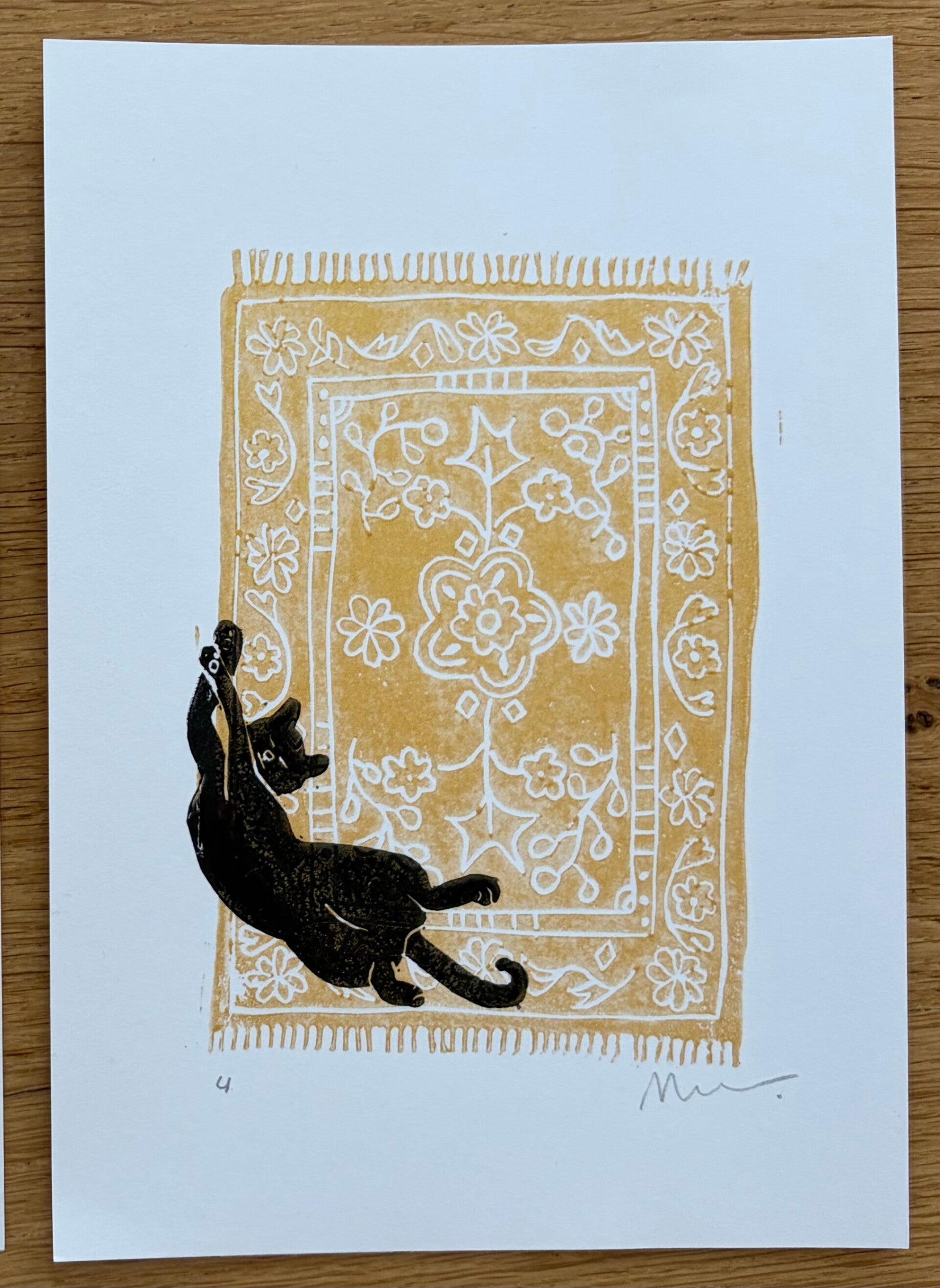 Lino print - kat op tapijt goud A5