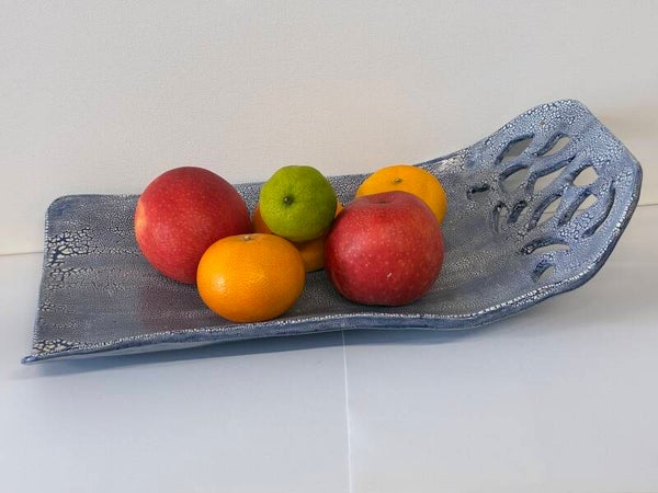 Fruitschaal met gaten