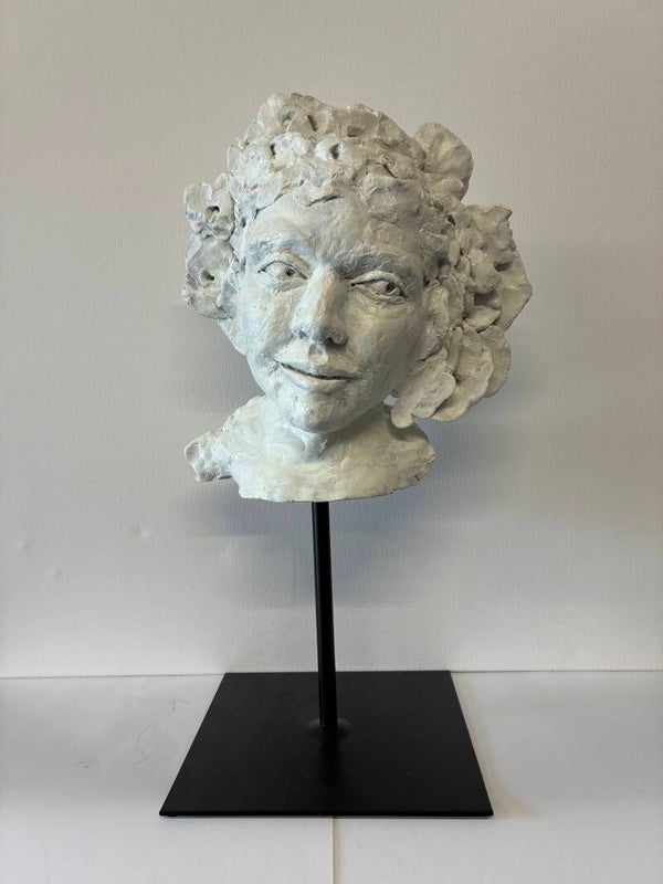 Kop meisje met krullen