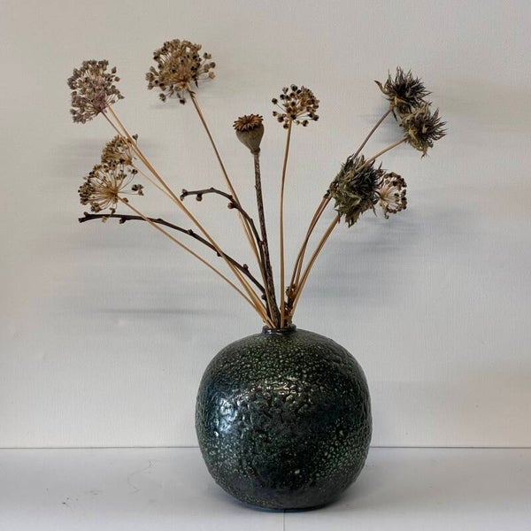 Pot met kleine opening boven