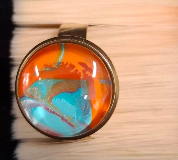 Ring goudkleur oranje/turkoois