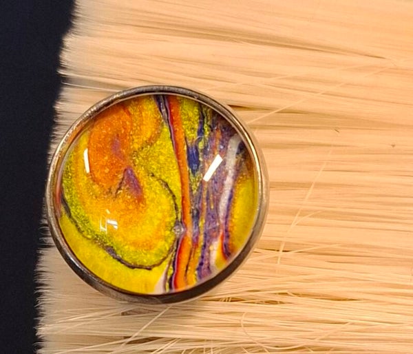 Ring zilverkleur geel/oranje/paars