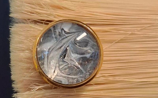Ring goudkleur zwart/wit
