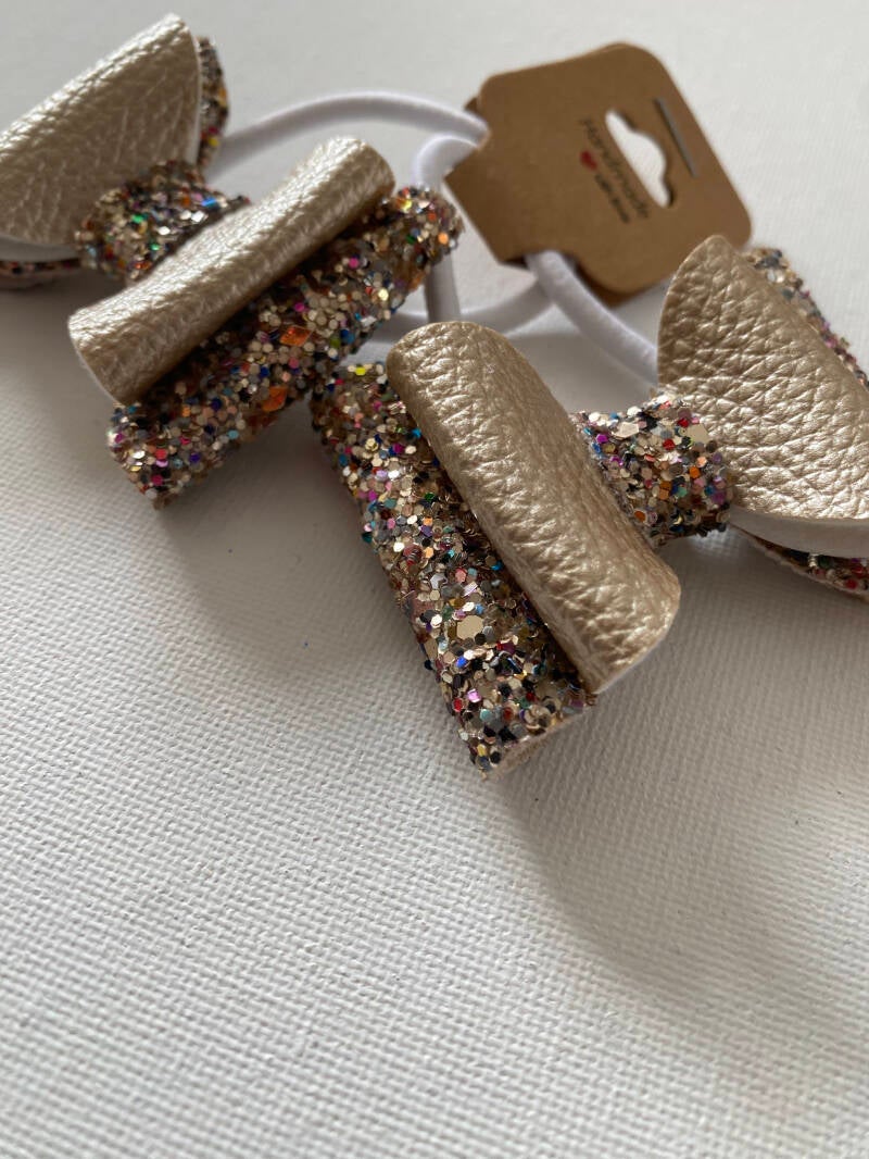 Gouden glitter elastiek, feestelijke elastiek. 