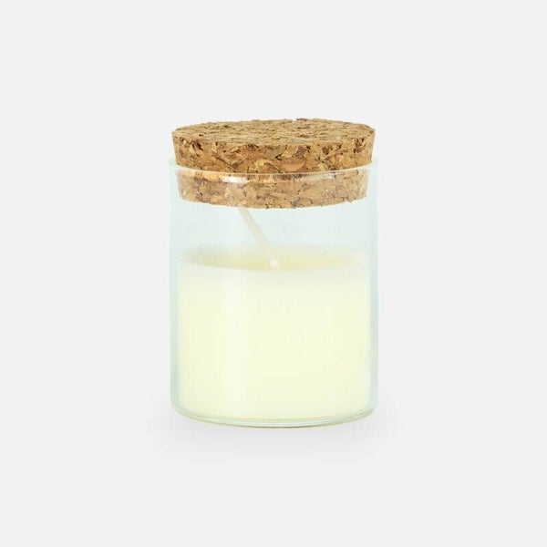 Kaarsje in glazen potje met kurk