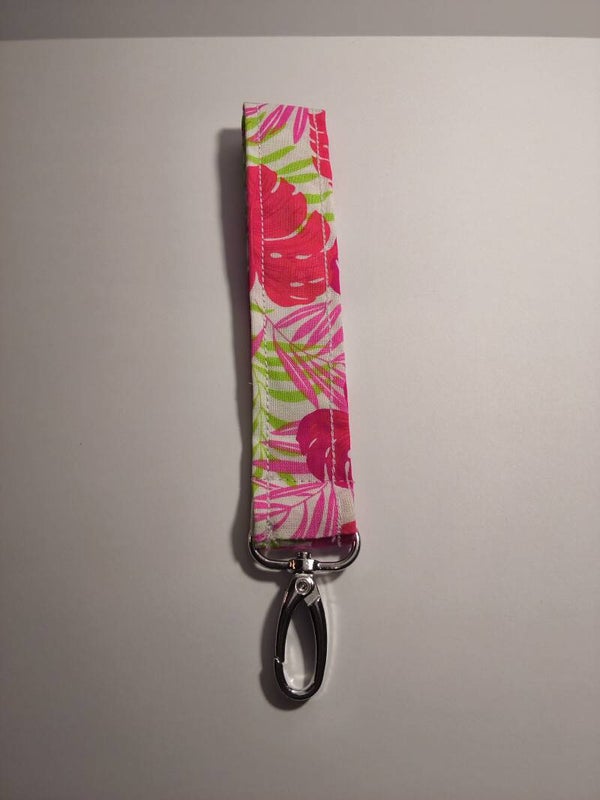 Pink and green tropical floral design keychain