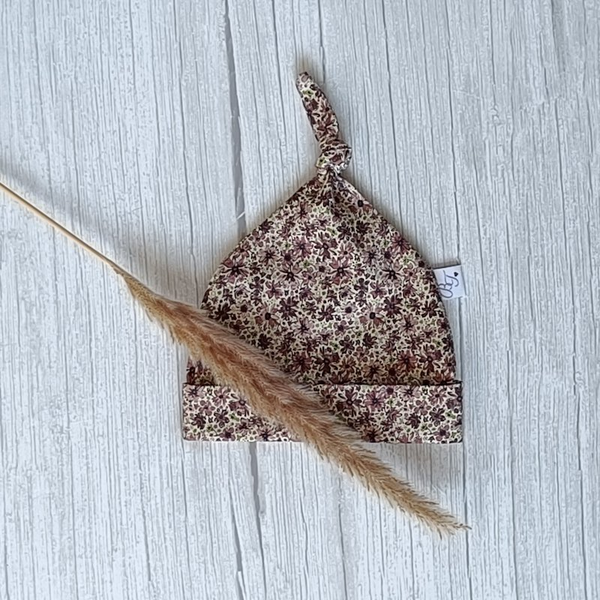 Mutsje Bloemen oud mauve 0-3maanden