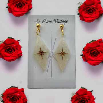Harlequin Earrings in a shimmering glitter with Atomic starburst centres