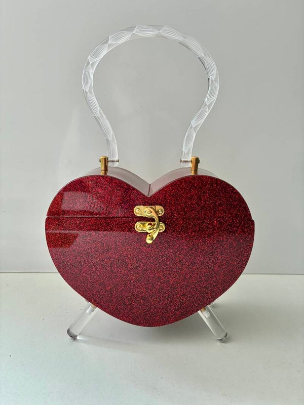 Heart Lucite style purse.