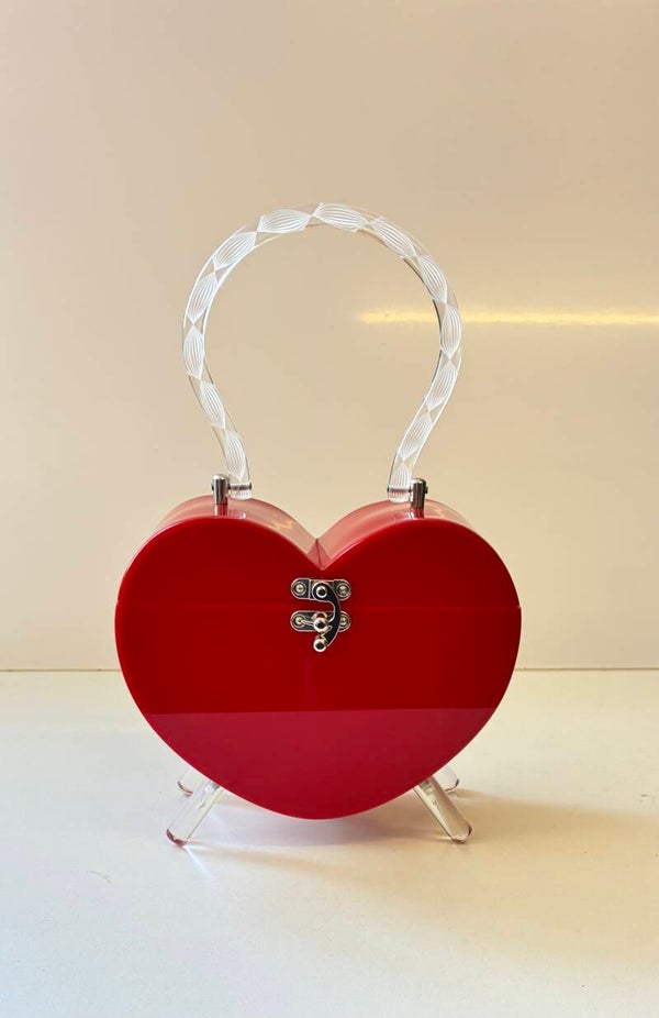 Heart Lucite style purse.