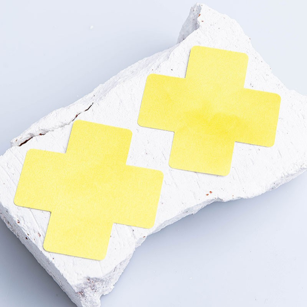 Kruis tepel stickers - neon geel