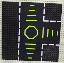 Black Baseplate, Road 32 x 32 9-Stud T Intersection with Green Octagon Pattern